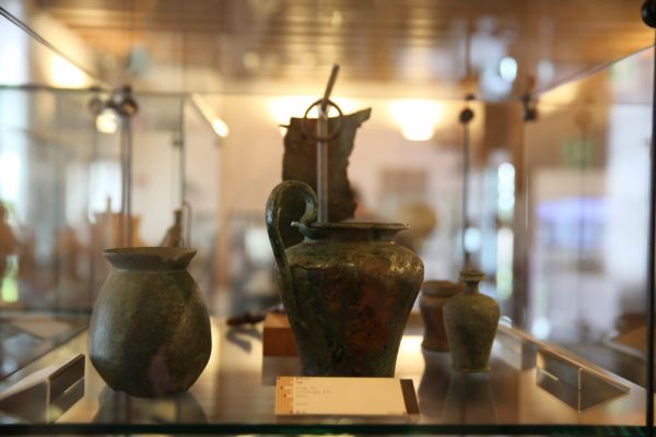 Roman bronzes: jug I-II century AD and glass – Archaeological Section, Torcello Museum, Venice
