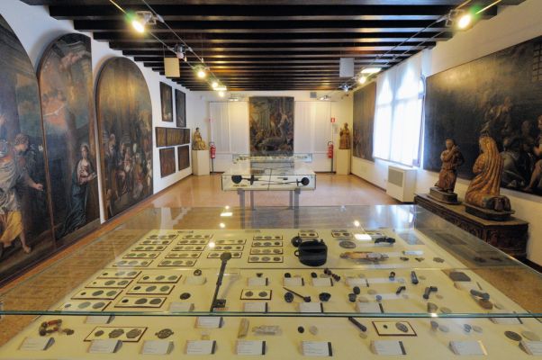 Upper room showcase with relics from Torcello, leaden bubbles, seals -Medieval and Modern Section, Torcello Museum, Venice